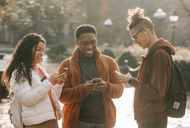 Three students on college campus